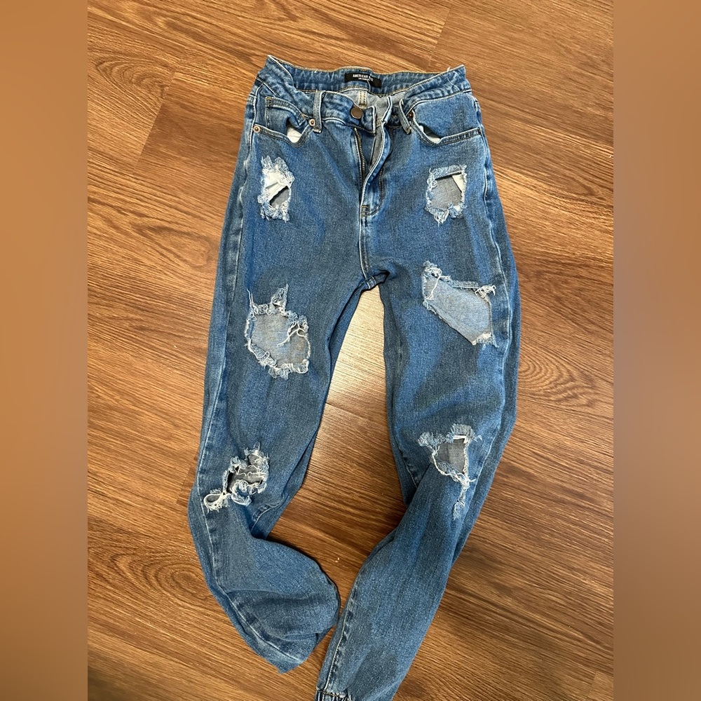 Ripped blue jeans